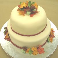 First Tiered Cake wilton course 3 final cake. fondant covered with sugarpaste acorns and leaves