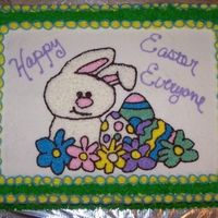 Easter Cake Red velvet cake with cream cheese icing, candy eggs in the grass