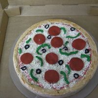 Pizza Cake Yellow cake and P.B. Buttercream. White chocolate bar grated for cheese. I used the FBCT idea for the pepperoni, peppers, and olives