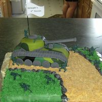 Army Tank Cake for friends son, RKT tank, inside of cake was camo too. My friend sent me a picture of the design, don't know where she got it, I...