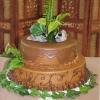 Wilburn_Groom.jpg chocolate buttercream, chocolate wafer border with ganache topping