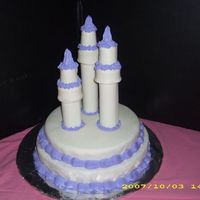 Castle Cake this was my first time at fondant, and I used whipped icing on the border (all the purple)