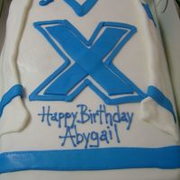 St. Fx Hockey Jersey! This cake was for a young lady who has accepted a hockey scholarship in Halifax, Canada!