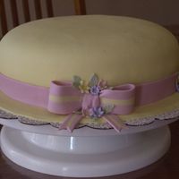 Mother's Day Hat Cake Cake for my mom and grandma for Mother's Day. White cake with lemon cream filling and frosting. Covered with fondant.