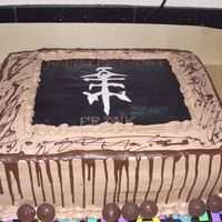Jaguares Birthday Cake Symbol on cake is from my husband's favorite music group Jaguares. Dark chocolate cake with dark chocolate mousse filling and whipped...