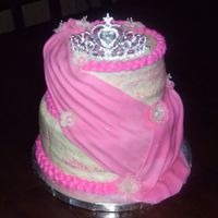 Princess Cake Cake made for my 12 year old niece's birthday. Cake is chocolate with fresh strawberry and chocolate whipped filled. Iced with white...