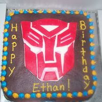 Transformer Cake My first attempt at something like this. I was not happy with the red bleeding into the white. How can I fix this for the next time?