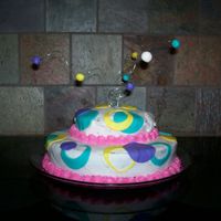 First Whimsical Cake Iced in BC. Fondant circles. First time with the balls on Wire. If anyone has any suggestions on putting anything on wire let me know!