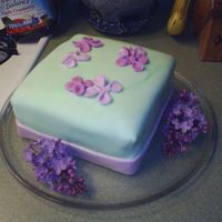 Mother's Day This was my first cake made with fondant. the flowers didnt really work out for me, so they are kind of shapeless and generic shapes!...