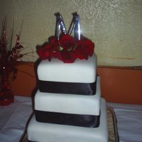 First Wedding Cake First layer: Red VelvetMiddle: ChocolateTop: white