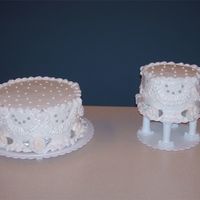 Wedding Cake White cake (yes I used Duncan Hines this time, no super good white cake scratch recipe for me :P) with buttercream frosting & roses....