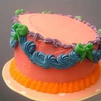 Whimsical whimsical cake from whimsicalbakehouse book...I used Italain meringue BC to decorate it.