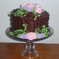 Basket Of Flowers Made for a classmate at college, but we ended up not being able to make it to class that night, so here's the cake. :P Chocolate sour...