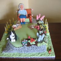 Garden Birthday Cake I did this cake for a lady who was 80 and loved her garden and her dog. She also loved her cake and refused to cut it.