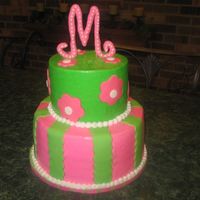 Pink & Green Monogram This was for my best friend's daughter on her 5th birthday. 6" top tier is chocolate, 9" bottom tier is vanilla - both with...