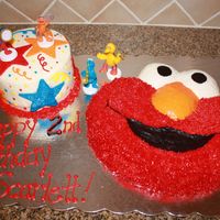 Elmo Cake Wilton pan used for elmo cake for my niece's 2nd birthday. She loves all sesame street, but elmo the most. Both cakes are WASC. Had to...