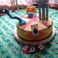 X-Men Cake X men cake featuring Classic yellow and red X men logo, Fondant Nightcrawler tail, gum paste Wolverine claws, Fondant and cast sugar...