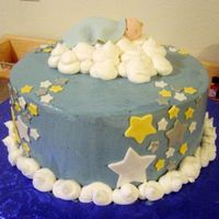 Stars And Clouds Baby Shower White cake with raspberry filling. Hard to tell from the picture, but stars were pearl, gold, and silver. Clouds were dusted with pixie...