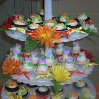 Gerber Cupcake Tree... yellow and orange gerber daisies with matching ribbon