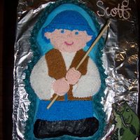100_1593.jpg Bass Fisherman Cake- Made with the lil' hero cake pan. Fish is a Chocolate chip cookie iced with buttercream.