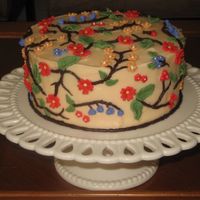 Img_0019.jpg irish cream cake with buttercream icing & fondant flowers & leaves