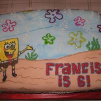 Sponge Bob fondant-covered chocolate cake decorated with royal icing, buttercream & piping gel