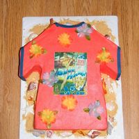 Blue Hawaii Shirt Made this for my mom for her birthday. She is a huge Elvis fan so we had a luau for her. Shirt cut out of a half sheet cake with edible...