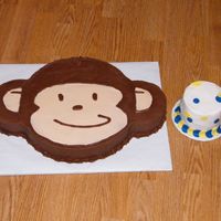 Mod Monkey 1st birthday cake. Mod Monkey made to match party supplies. Monkey is all b/c and the smash cake is b/c with fondant circles