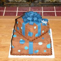 Presents 6 & 10 in squares. b/c frosting with fondant bow, ribbon & polka dots