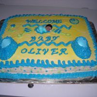 Cakes_And_Graduation_020.jpg This is a cake that I did for a co worker of mine it is my first baby shower cake that I have done. It is a yellow cake with buttercream...