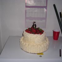 Husband's Graduation i am new to the forum and this is my first tiered cake that i have done. Idid this cake for my husbands graduation I figured it was a great...