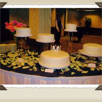 Separate Tiers Pearls On Fondant This is a copy of Earlene's Cake. Hand made pearls and fondant cutouts. I made four other cakes for this rather large wedding and didn...