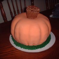 Pumpkin Cake For "novelty Cake" In My Decorating Class!!! Chocolate cake with raspberry filling, covered in fondant.