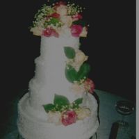 My First Wedding Cake (4-7-06) this is buttercream icing. First and bottom are decorated with carnelli lace and the 2 middle ones are decorated with dots.