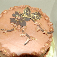 Chocolate Cricut Butterfly This was a Triple Chocolate Fudge with chocolate chips and buttercream. The butterfly and flower were my second attempt at using the Cricut...