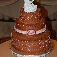 Chocolate & Pink Wedding Cake I made this cake for my stepsisters friend at the last minute. 6, 9 & 12" rounds. 6 & 9 are WASC with strawbery &...