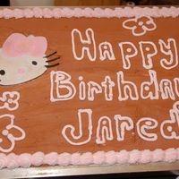 Hello Kitty This cake was for a guy in my office that loves Hello Kitty. The cake is a doctored German Chocolate mix w/BC icing. The Hello Kitty figure...