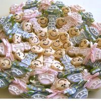 Baby Shower Cookies Another view of the rattle cookies and baby faces I made for my friend's daughter's baby shower. From the Flour Pot Cookie Book...