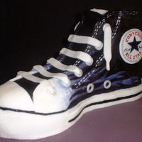 Converse Cake I made this for my daughter's 14th birthday. She wanted it painted the same as her new boots, so it is all hand painted fondant! The...