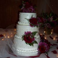 Wedding Cake 3 tiered simple wedding cake with handmade pearls and fresh flowers for best friend. Cake was supposed to be 5 tiers, but only 3 made it to...