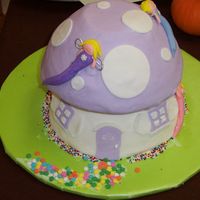 Debbie Brown's Fairy Toadstool I re-created Debbie Brown's Fairy Toadstool cake using a yellow cake and vanilla bc. Covered and decorated with MMF.
