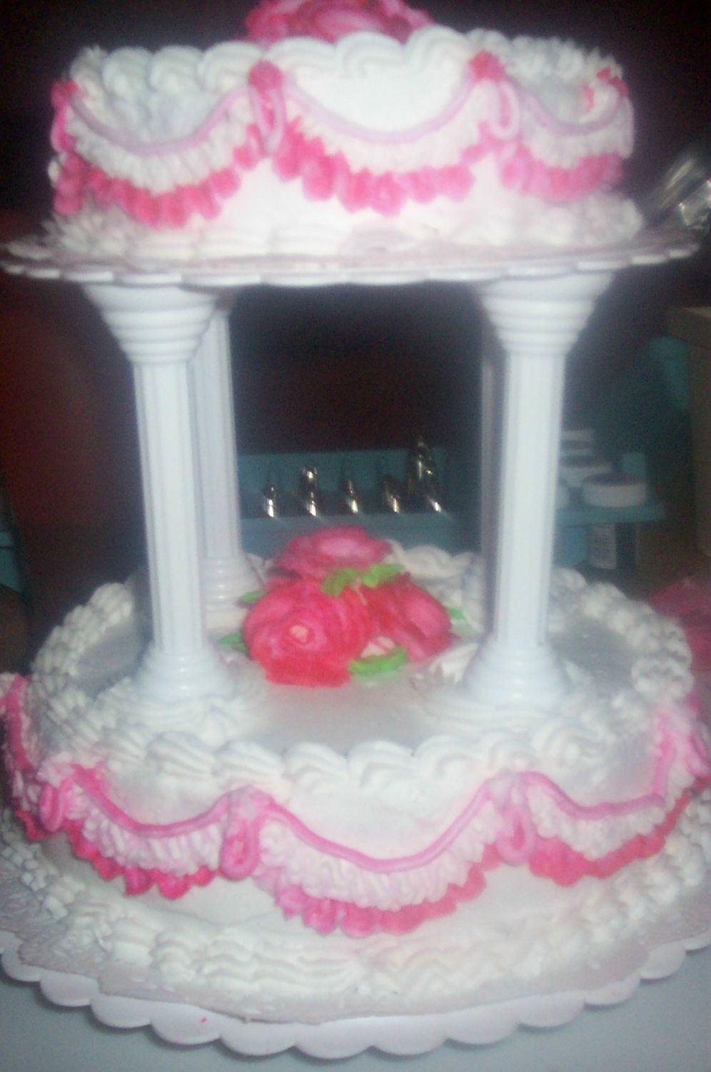 First Time Wedding Cake I made this mostly for practice. I used a 6" and an 8" cake. I tried the borders that I learned in class. I'm still in class...