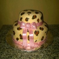Leapard Print Cake Fondant covered with hand painted spots and fondant bow