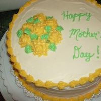 One Of My First Cakes After Taking Wilton Class buttercream was too thin for mums and piping--looked like it was melting. One day I'll get the consistency right!