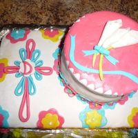 Baptism Cake For Dehlila Have to thank sweettreat for the quilled cross idea. This cake was for a friends grand-daughters baptism. Thanks for looking !