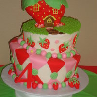 Topsy Turvy Strawberry Shortcake Theme Birthday Cake White cake with cream cheese marshmallo cream filling with fresh strawberries, with cream cheese butter cream frosting, decorations in...
