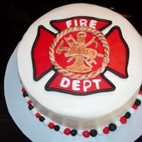 Fire Fighter Groom Cake this was my cousins hubby's grooms cake. white cake with buttercream filling and frosting. with fondant decorations. he is a volunteer...