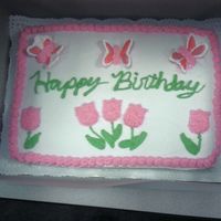 Butterflies And Flowers Birthday cake for a coworkers daughter. Only request was for the cake to be white, pink, and green