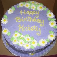 Daisy Birthday Cake 12 inch Choc with strawberry filling- My friends daughter wanted lavender and daisies. This is what I came up with. Not great, but I am...