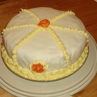 Grandparent's Anniversary Cake Well, It didn't come out the way I planned. Everyone liked it though. WE used a recipe from The Cake Bible that we didn't like...